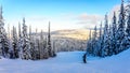 Skier Enjoying the Sunset over the Shuswap Highland