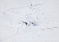 Skier after falling down on mountain slope