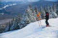 Skier getting ready downhill at Peak Mansfield at Stowe Mountain Resort, Vermont. Royalty Free Stock Photo
