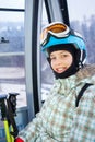 Skier girl on ski lift Royalty Free Stock Photo