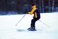 A skier glides over the snow