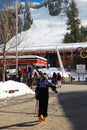 A skier heads towards the lift