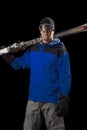 Skier holding a pair of skis Royalty Free Stock Photo