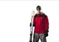 Skier holding a pair of skis Royalty Free Stock Photo