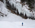 Skier and Icicle curtain in snowy landscape Royalty Free Stock Photo