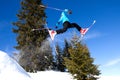 Skier in a jump from a ramp Royalty Free Stock Photo