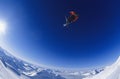 Skier Jumping Against Blue Sky