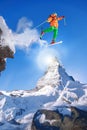 Skier jumping against Matterhorn peak in Switzerland. Royalty Free Stock Photo