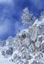 Skier Jumping From Mountain Cliff