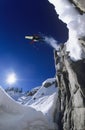 Skier Jumping From Mountain Cliff Royalty Free Stock Photo