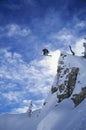 Skier Jumping From Mountain