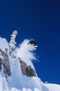 Skier Jumping From Mountain Ledge Royalty Free Stock Photo