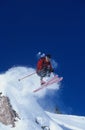 Skier Jumping From Mountain Ledge Royalty Free Stock Photo