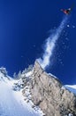 Skier Jumping From Mountain Ledge Royalty Free Stock Photo