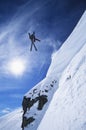 Skier Jumping From Mountain Ledge Royalty Free Stock Photo