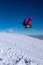 2021 winter season start man woman skier on the ski slope jumping Royalty Free Stock Photo