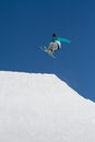 Skier jumps in Snow Park, ski resort