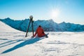 Skier man sitting and relaxing in front of mountain - Focus on head Royalty Free Stock Photo