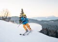 Skier man in snow powder produces braking on the slope of mountain Royalty Free Stock Photo