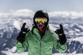 Skier in mask enjoying winter vacation Royalty Free Stock Photo