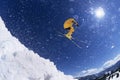 Skier in midair above snow Royalty Free Stock Photo