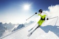 Skier in mountains, prepared piste and sunny day Royalty Free Stock Photo