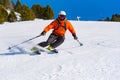 Skier in mountains, prepared piste and sunny day in Grandvalira, Andorra...I