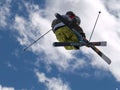 Skier performing half pipe