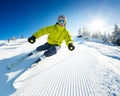 Skier on piste in high mountains Royalty Free Stock Photo