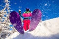 Skier is preparing for jump, lower angle of ski, blue sky winter forest Royalty Free Stock Photo
