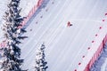 Skier racing down the Steep Speed skiing slope at Velocity Challenge and FIS Speed Ski World Cup Race at Sun Peaks Ski Resort