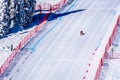 Skier racing down the Steep Speed skiing slope at Velocity Challenge and FIS Speed Ski World Cup Race at Sun Peaks Ski Resort Royalty Free Stock Photo