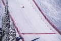 Skier racing down the Steep Speed skiing slope at Velocity Challenge and FIS Speed Ski World Cup Race at Sun Peaks Ski Resort