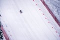 Skier racing down the Steep Speed skiing slope at Velocity Challenge and FIS Speed Ski World Cup Race at Sun Peaks Ski Resort