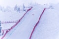 Skier racing down the Steep Speed skiing slope at Velocity Challenge and FIS Speed Ski World Cup Race at Sun Peaks Ski Resort