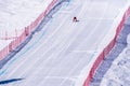 Skier racing down the Steep Speed skiing slope at Velocity Challenge and FIS Speed Ski World Cup Race at Sun Peaks Ski Resort Royalty Free Stock Photo