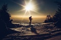 skier reaching the summit at sunset Royalty Free Stock Photo