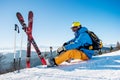 Skier resting on top of the mountain Royalty Free Stock Photo