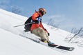 Skier rides steep mountains. Kamchatka Peninsula, Far East, Russia