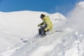 Skier running down the mountain slope in wonderful resort Gudauri, Georgia