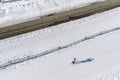 Skier running on the track. Snow white field. Aerial Royalty Free Stock Photo