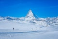 Skier see beautiful view of snow mountain Matterhorn peak, Zermatt, Switzerland Royalty Free Stock Photo