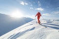 Skier ski touring on mountain ridge