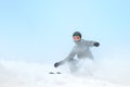 Skier skidding in the snow, off piste. Royalty Free Stock Photo