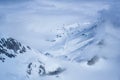 Skier skiing alone on the ski slope towards Matterhorn mountain on a beautiful view in Switzerland