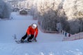 Skier skiing down the hill, winter day, Moscow region, Russia Royalty Free Stock Photo