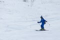 Skier skiing downhill in high mountain. Good winter day, ski season. Winter sport theme. Gusar - Azerbaijan: January