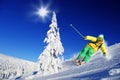 Skier skiing downhill in high mountains Royalty Free Stock Photo