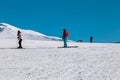 Skier skiing downhill in high mountains Ski slopes and Ski lifts. Royalty Free Stock Photo