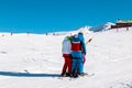 Skier skiing downhill in high mountains Ski slopes and Ski lifts. Royalty Free Stock Photo